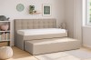 Rica Kindersofa in Beige im Kinderzimmer mit ausgezogenem Gästebett und Stauraum.