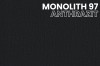 Nahaufnahme der Stofftextur Monolith 97 in Anthrazit für hochwertige Polstermöbel.