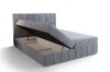 Boxspringbett in Hellgrau mit praktischem Stauraum durch klappbaren Bettkasten.