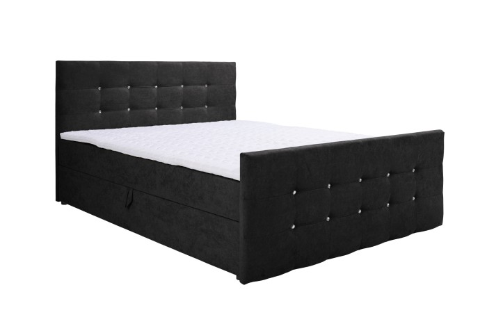 Schwarzes Boxspringbett mit Knopfsteppung und Kristallsteinen.