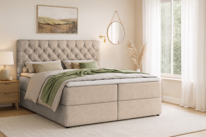 Modernes Schlafzimmer-Design mit komfortablem beige Boxspringbett und harmonischer Dekoration.