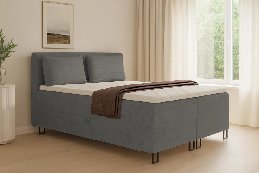 Modernes graues Boxspringbett Texas für Stil und Komfort im hellen Schlafzimmer.