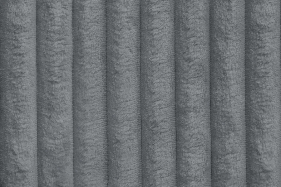 Detailansicht der grauen TILIA Textur mit weichen, breiten Cord-Rippen.