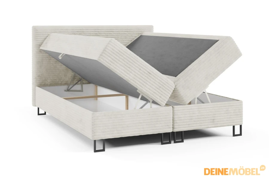 Freigestellte Ansicht des Boxspringbetts Texas mit zwei weit geöffneten Bettkästen.