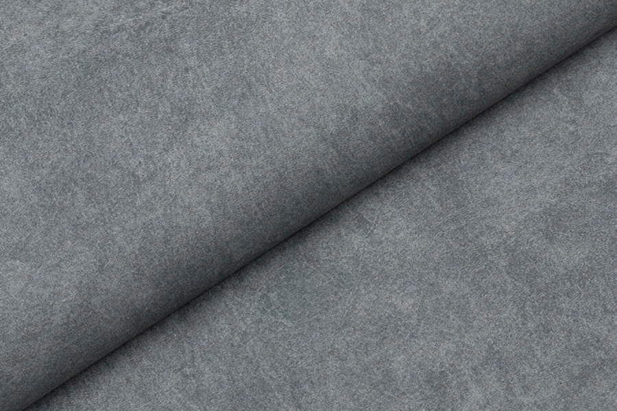 Detailansicht des hochwertigen grauen Polsterstoffes für das Sofa Elmo.