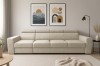 Beige 4-Sitzer Couch im modern eingerichteten Wohnzimmer mit abstrakten Wandbildern.