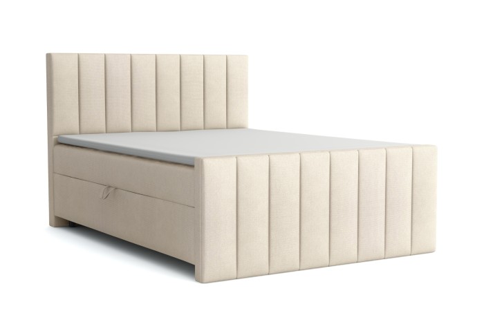 Elegantes Boxspringbett in Creme mit vertikal gestepptem Kopf- und Fußteil für das Schlafzimmer.