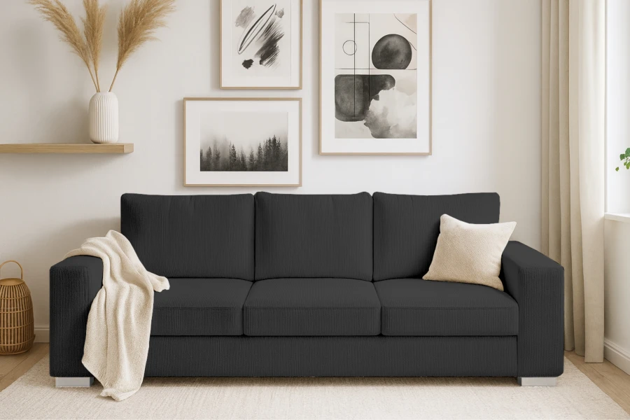 Elegante antracietkleurige ribbank in een licht ingerichte woonkamer.