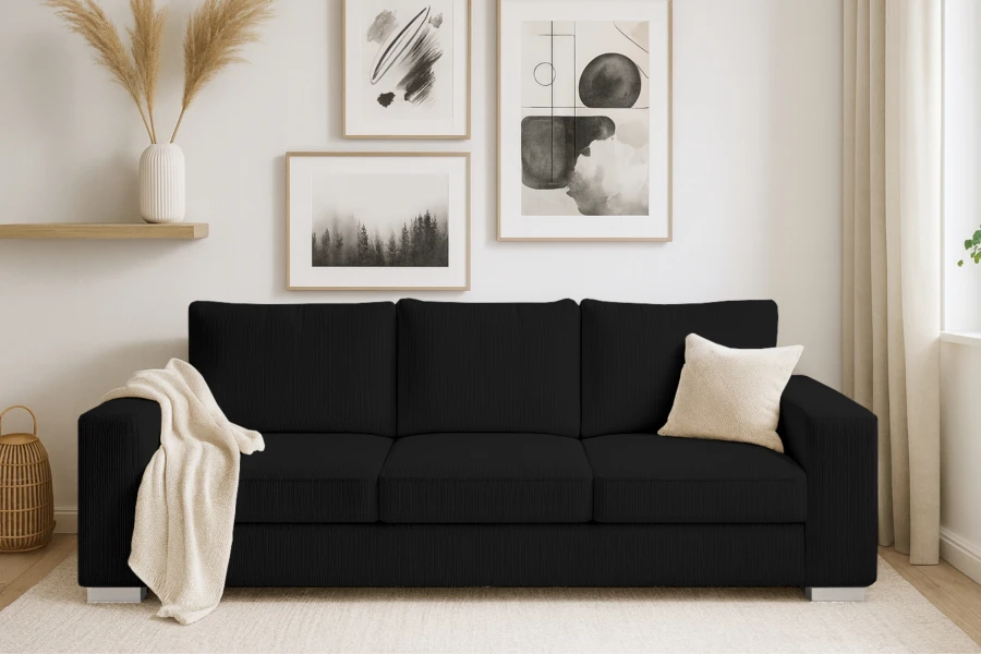 Zwarte ribbank in een modern ingerichte woonkamer met wanddecoratie en decoratie.