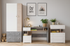 Kinderzimmer Schreibtisch mit Kleiderschrank und Kommode in Weiß und Eiche-Optik.