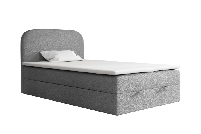 Graues Boxspringbett-Einzelbett mit weißem Topper und Kopfteil auf weißem Grund.