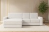Einladendes weißes Bouclé-Ecksofa im modernen Wohnzimmer-Ambiente