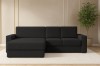 Ecksofa in Schwarz im stilvollen Wohnzimmer mit Teppich und Zimmerpflanze.