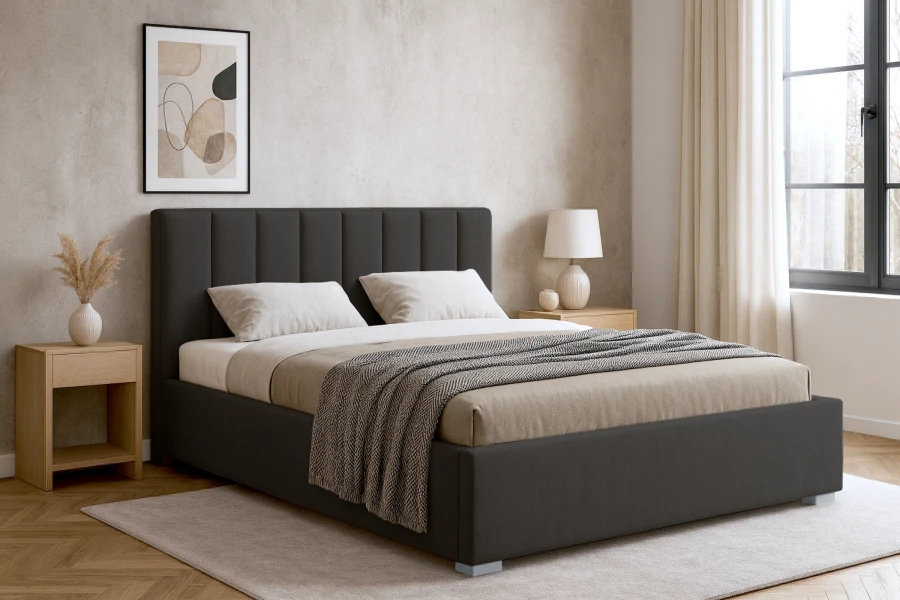 Modern eingerichtetes Schlafzimmer mit anthrazitfarbenem Polsterbett