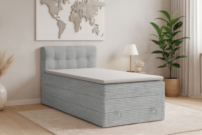 Graues Boxspringbett Jung II mit Cord-Stoff und Topper für das Jugendzimmer.