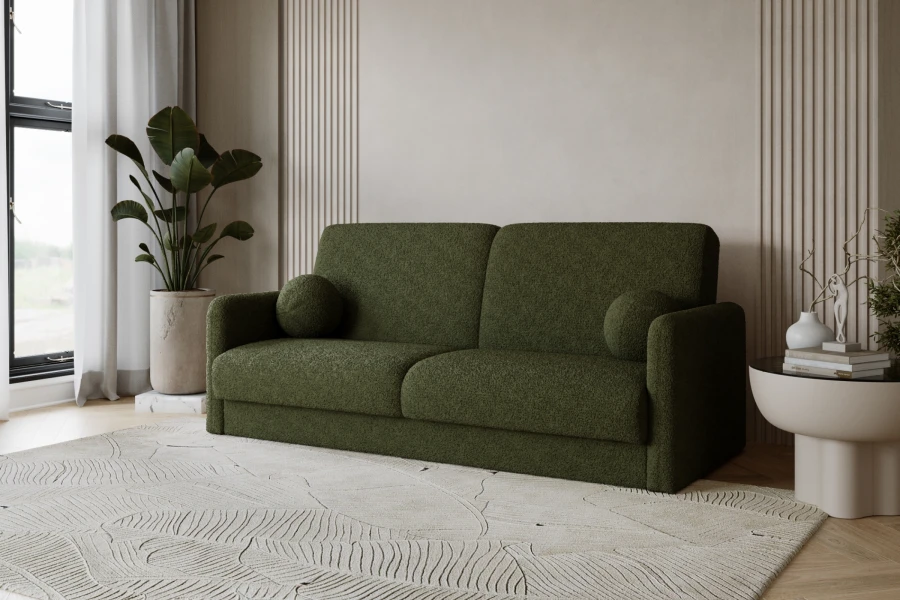 Grünes Bouclé-Sofa mit runden Kissen in einem hellen Wohnzimmer mit modernen Akzenten.