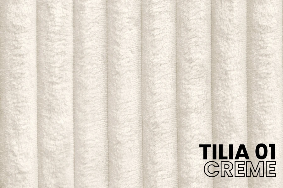 Close-up van de hoogwaardige corduroy-bekledingsstof Tilia 01 in de kleur crème voor gestoffeerde meubels.