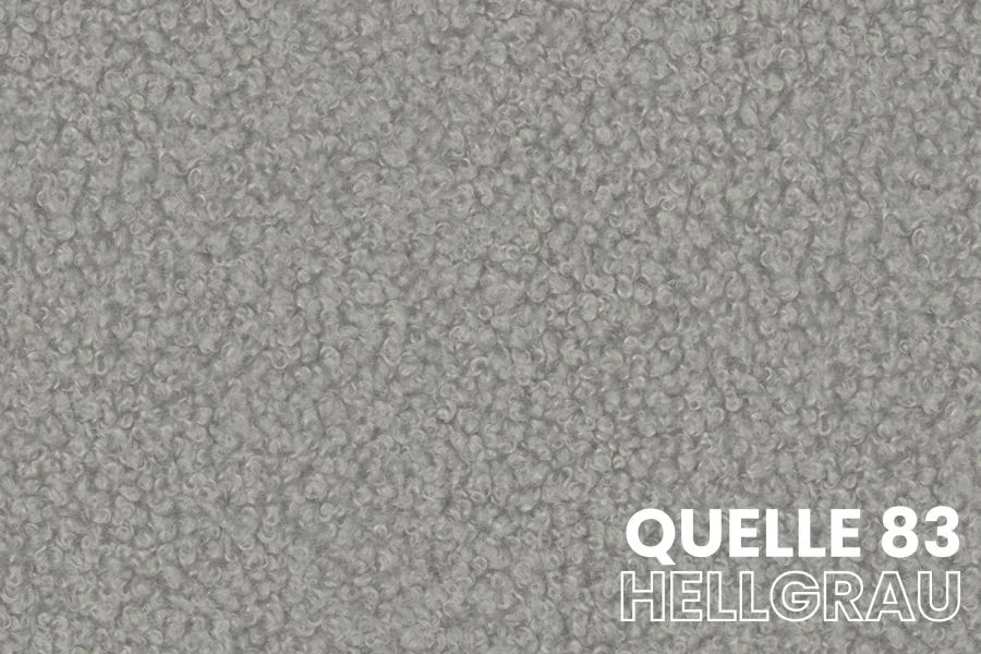 Stoffmuster Quelle 83 Hellgrau: Nahaufnahme der weichen Bouclé-Textur für Polstermöbel.