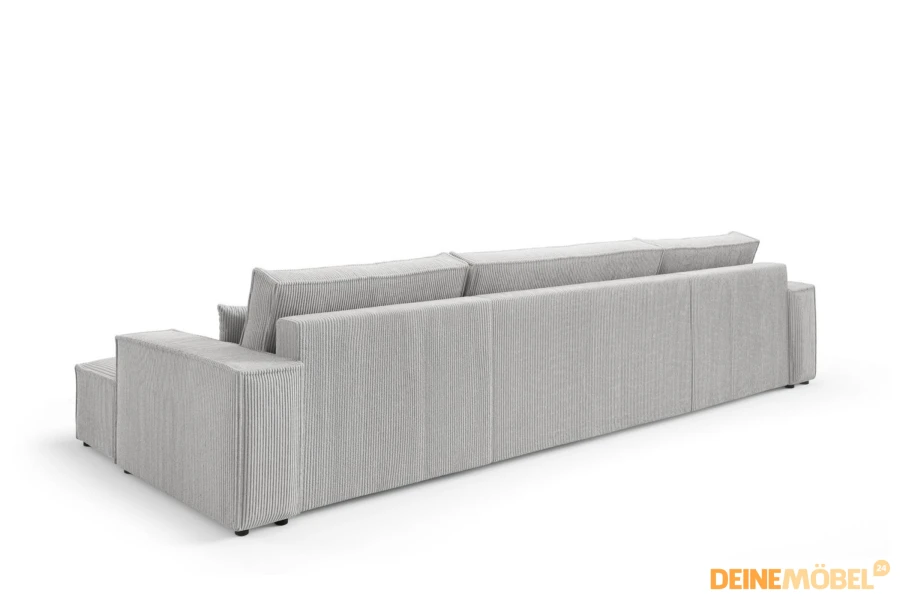 Rückansicht des großen Cord-Sofas in Hellgrau, ideal als Raumteiler im Wohnzimmer.