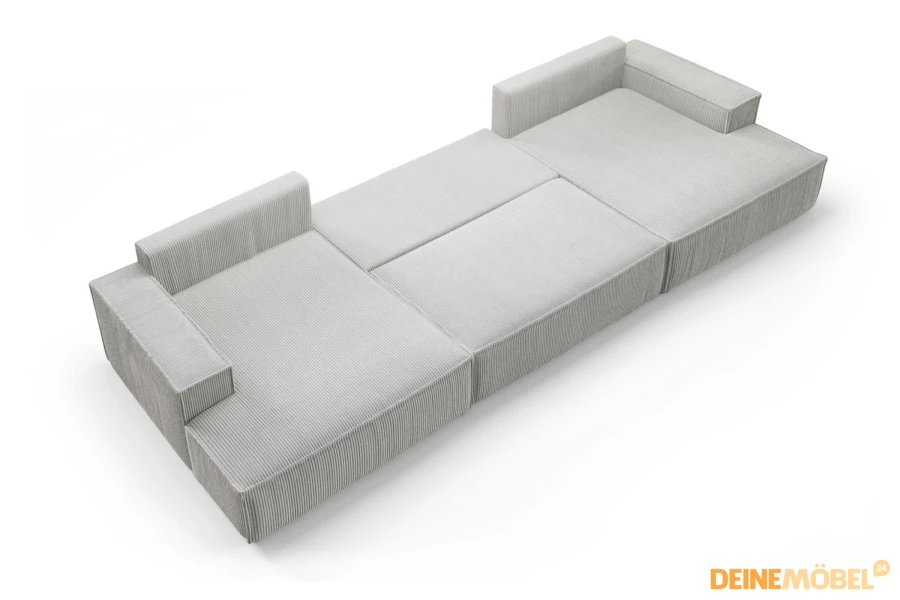 Großzügige Liegefläche des hellgrauen Cord-Sofas mit praktischer Schlaffunktion.