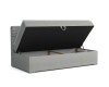 Opened upholstered bed with a large bed base for additional storage space.