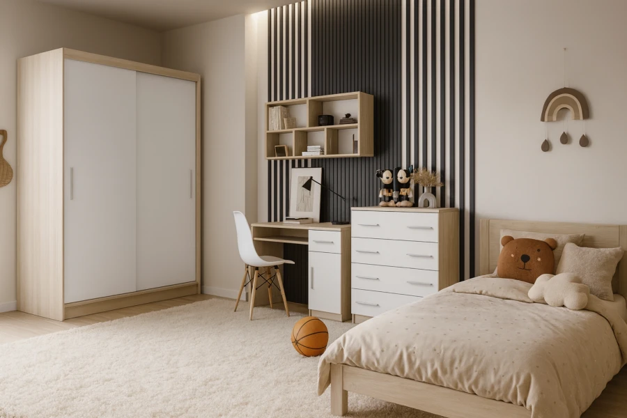 Furnished children's room with white wardrobe, desk, chest of drawers and bed.