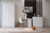 Interior example for a modern youth room with white furniture, desk and rug.
