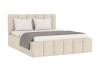 Beige Polsterbett Megan mit gestepptem Kopfteil, weißen Kissen und grauer Tagesdecke.