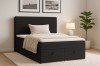 Elegantes schwarzes Boxspringbett mit Stauraum-Funktion im modernen Schlafzimmer.