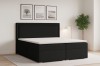 Gemütliches Schlafzimmer mit dem schwarzen Boxspringbett John II und Dekoration