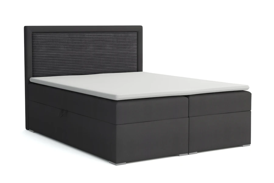Boxspringbett John II in dunklem Anthrazit vor weißem Hintergrund.