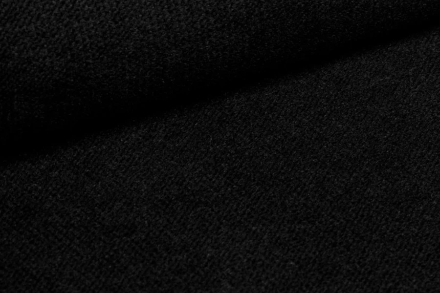 Schwarzer Polsterstoff in detailreicher Nahaufnahme