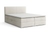 Beiges Boxspringbett mit Bettkasten und hohem Kopfteil, modern gestaltet.