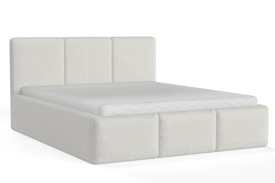 Modernes weißes Boxspringbett bezogen mit weichem Teddy-Stoff.