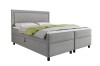 Graues Boxspringbett Lars mit gepolstertem Kopfteil und Bettkasten auf weißem Grund.