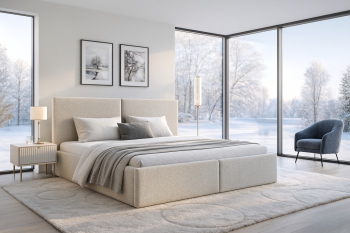 Gemütliches Schlafzimmer mit Ben Polsterbett und Blick auf Winterlandschaft.