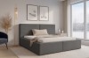 Schlafzimmer-Inspiration: Anthrazitfarbenes Polsterbett Berno in modernem Ambiente mit Deko.