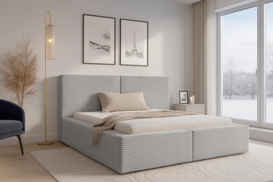 Hellgraues Cord-Polsterbett in einem modern eingerichteten Schlafzimmer mit Winterblick.