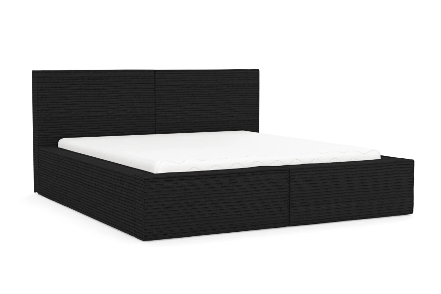Schwarzes Doppelbett aus Cord-Stoff mit hohem Kopfteil vor weißem Hintergrund.