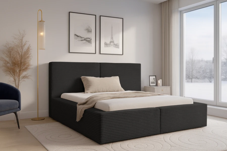 Modernes schwarzes Polsterbett in Cord-Optik in gemütlichem Schlafzimmer-Ambiente.
