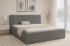 Elegantes dunkles Polsterbett in Anthrazit in einem modernen Schlafzimmer mit Winterblick.