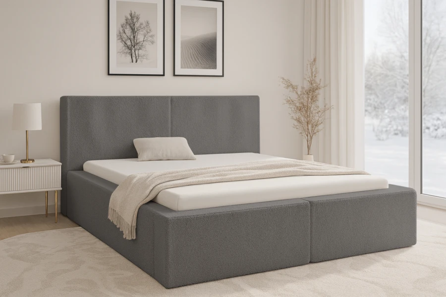 Elegantes dunkles Polsterbett in Anthrazit in einem modernen Schlafzimmer mit Winterblick.