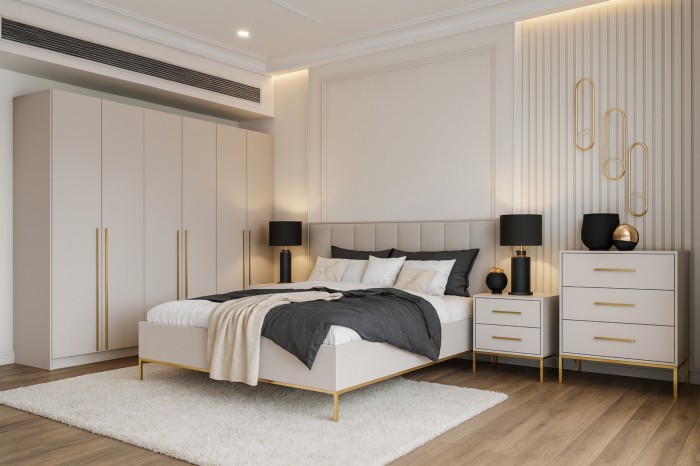 Luxuriös eingerichtetes Schlafzimmer mit beigem Polsterbett, Schrank und Kommode.