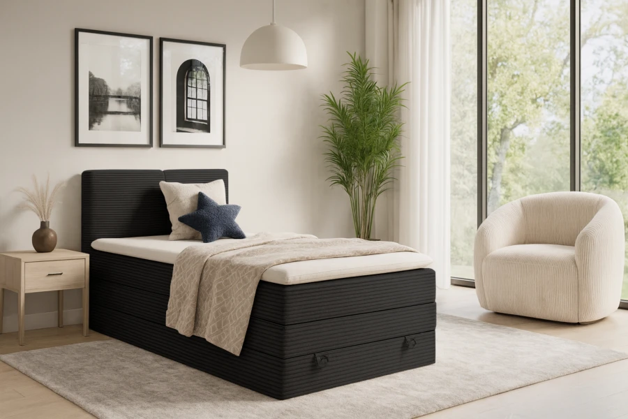 Stilvolles Boxspringbett in Dunkelgrau mit Cord-Stoff POSO 135 im Schlafzimmer-Ambiente.