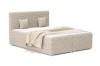 Boxspringbett aus beigem Cordstoff mit weichem Kopfteil