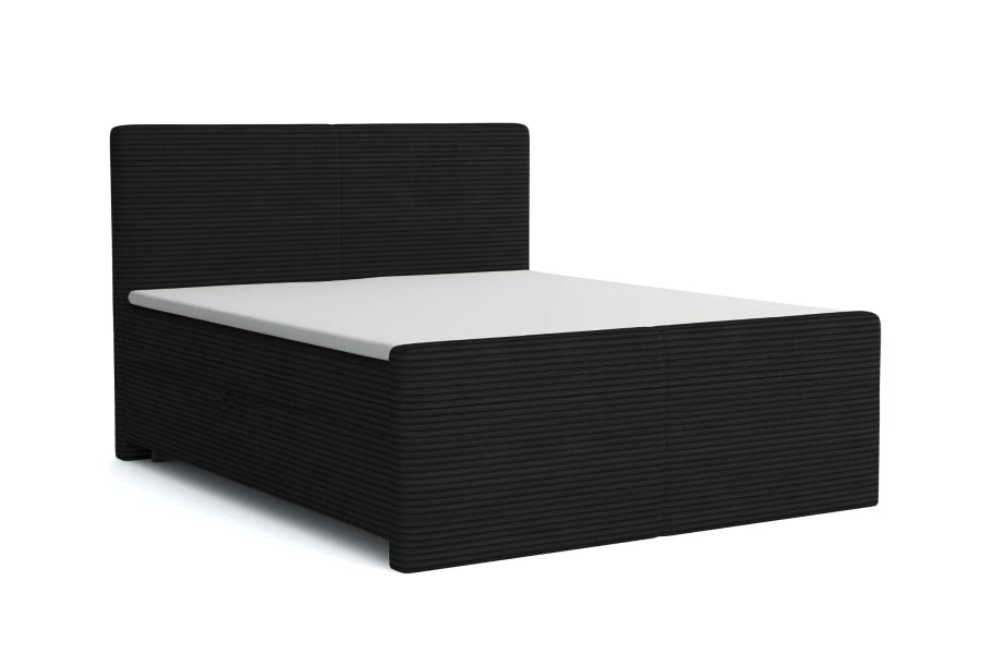 Zwart boxspringbed MIDI met markante ribbeloptiek, vrijstaand tegen een witte achtergrond.