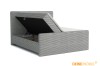 Grijs boxspringbed van corduroy met geopende bedbak voor opbergruimte.