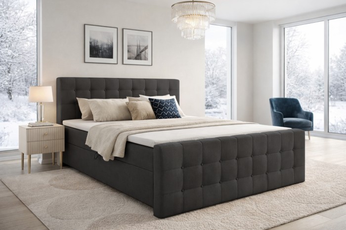 Gemütliches Schlafzimmer-Ambiente mit dem Boxspringbett Reel in dunklem Grau.