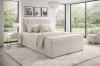Crèmekleurig boxspringbed Vincent met gezellige bouclé-bekleding