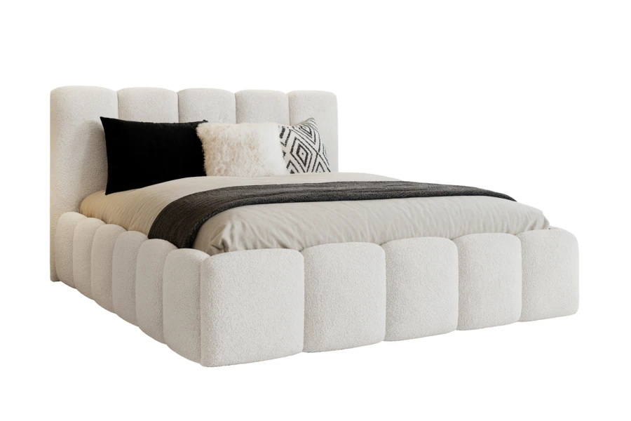 Freigestelltes weißes Design-Bett mit markanter Polsterung in Bouclé-Stoff.